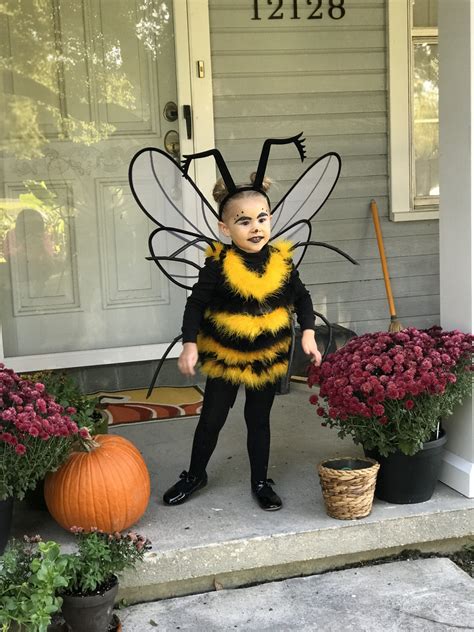Bee costume diy - Sep 20, 2014 · DIY Bee Costume. Black sweatshirt and sweatpants. Black headband, 2 pipe cleaners and styrofoam balls painted black. Wire hanger, black panty hose or tights, elastic or ribbon. Yellow tape. – Make stripes on the sweatshirt with the yellow tape. – Wrap one end of the pipe cleaners around the center of the head band. 